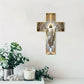 An old wooden wall cross with the image of Jesus Christ