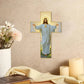 An old wooden wall cross with the image of Jesus Christ